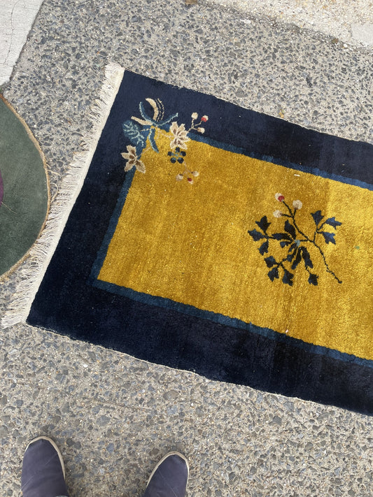 Gold field, central flowering branch and navy border of Chinese rug 1B1007