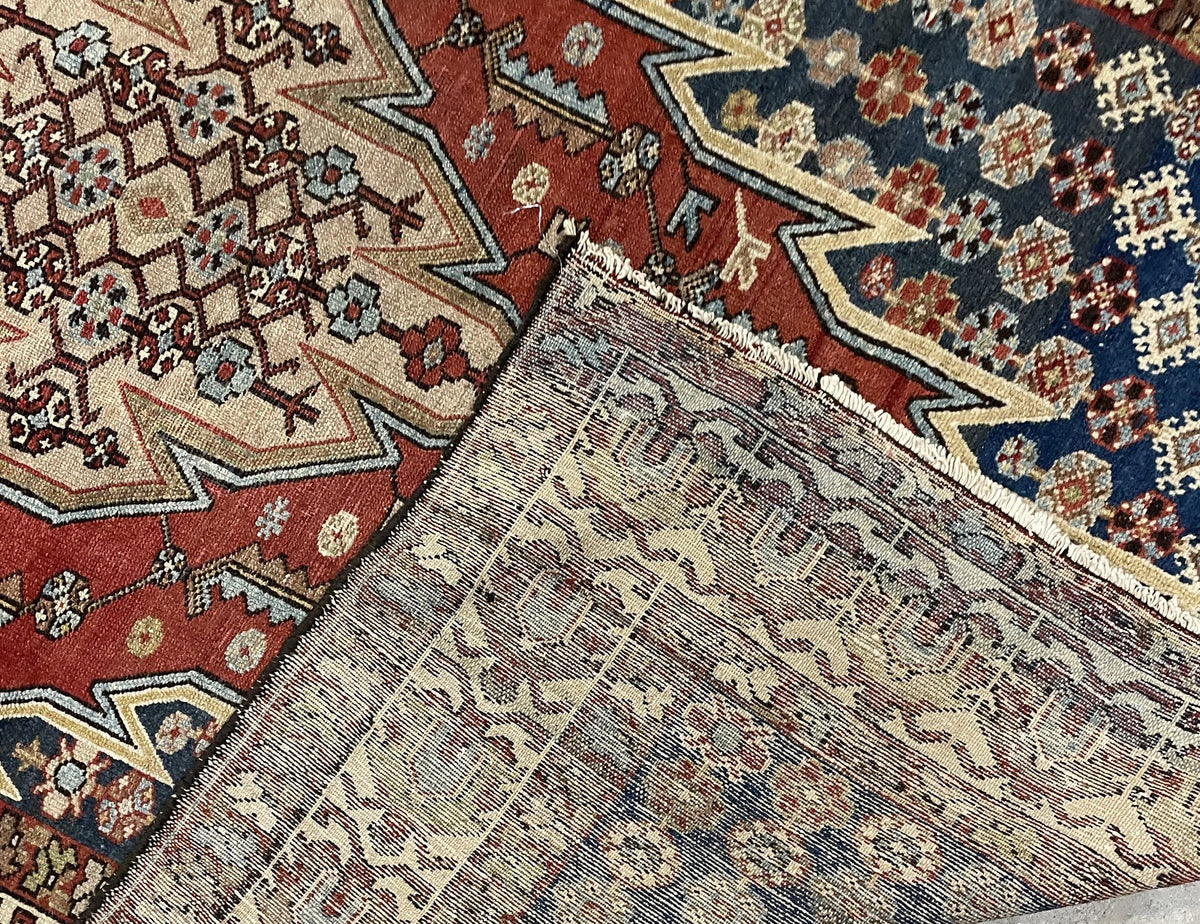 Angled border view with repeating palmettes and narrow floral bands