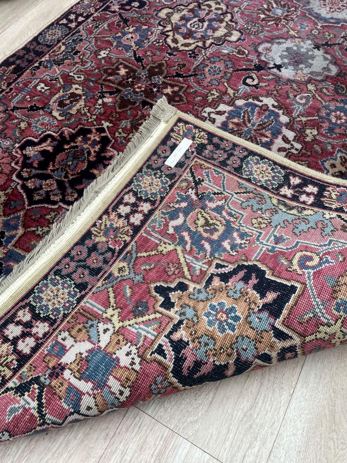 Vintage Karastan rug texture and lush worsted wool pile detail with original fringe intact