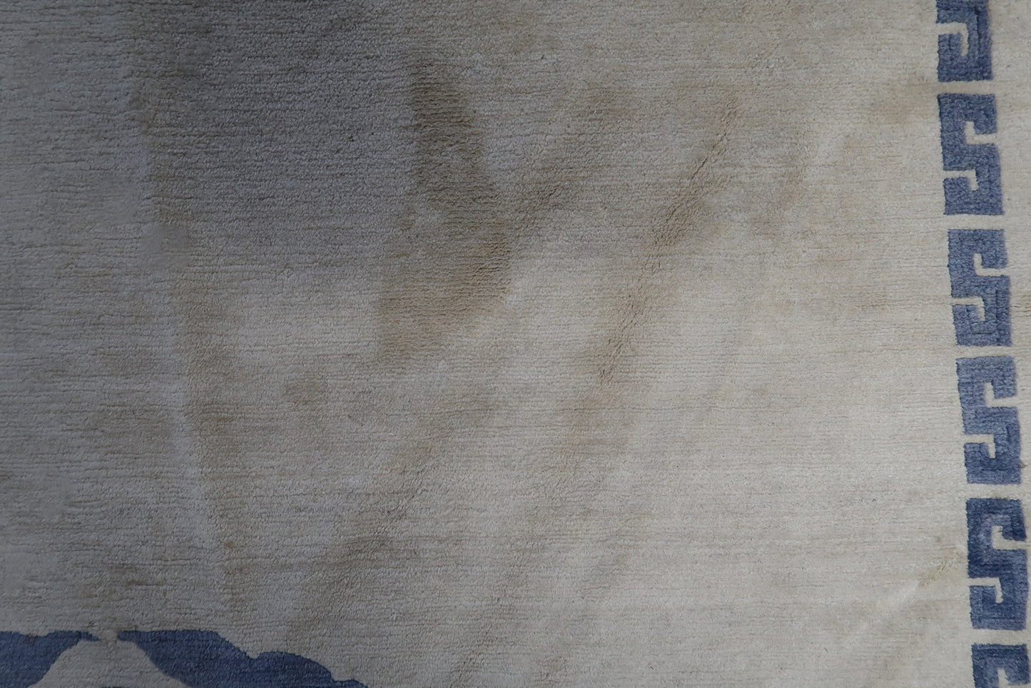 Intricate weaving technique evident in the detailed picture of the handmade vintage Tibetan Khaden rug