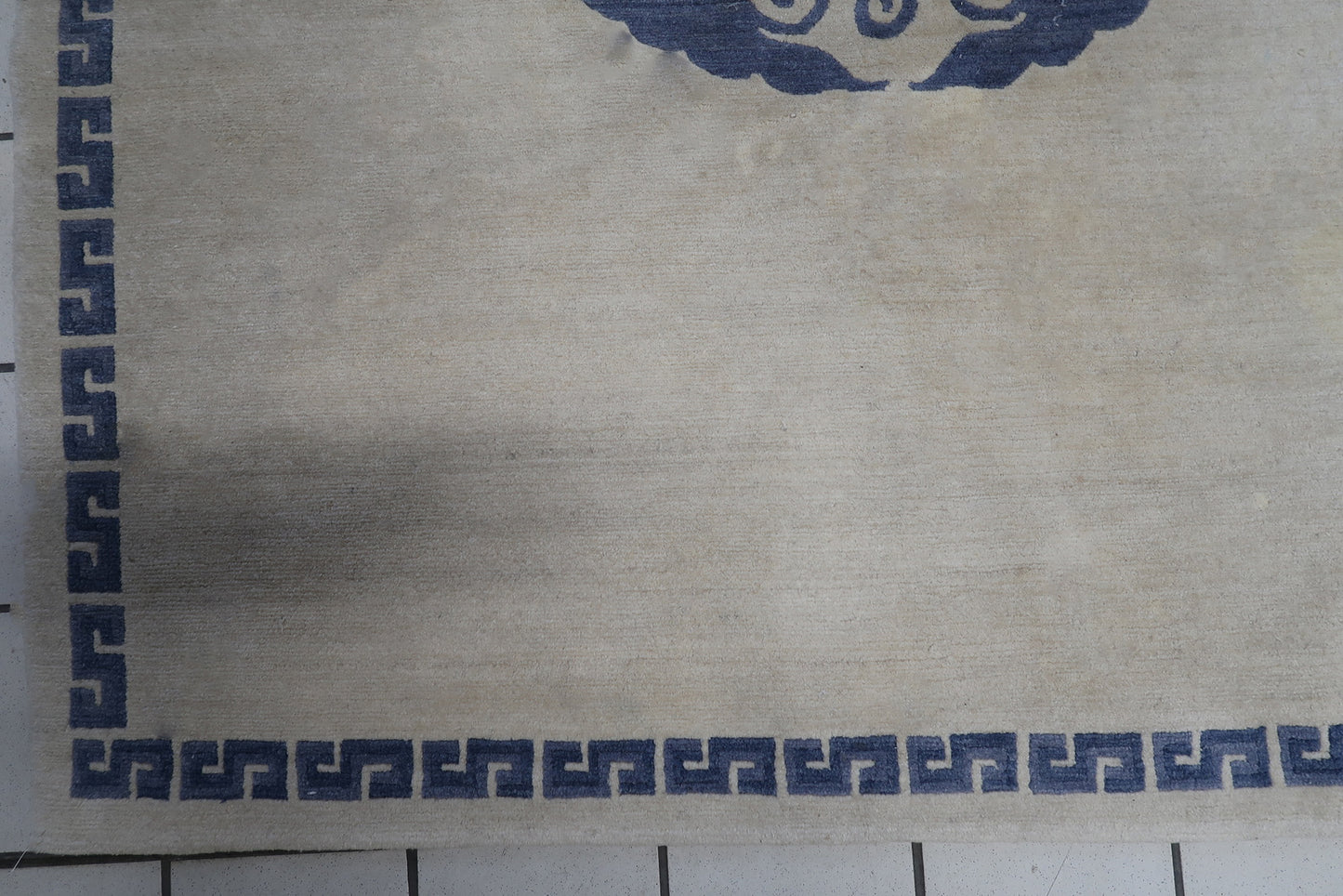 Detailed view of the thick and heavy pile of the handmade vintage Tibetan Khaden rug