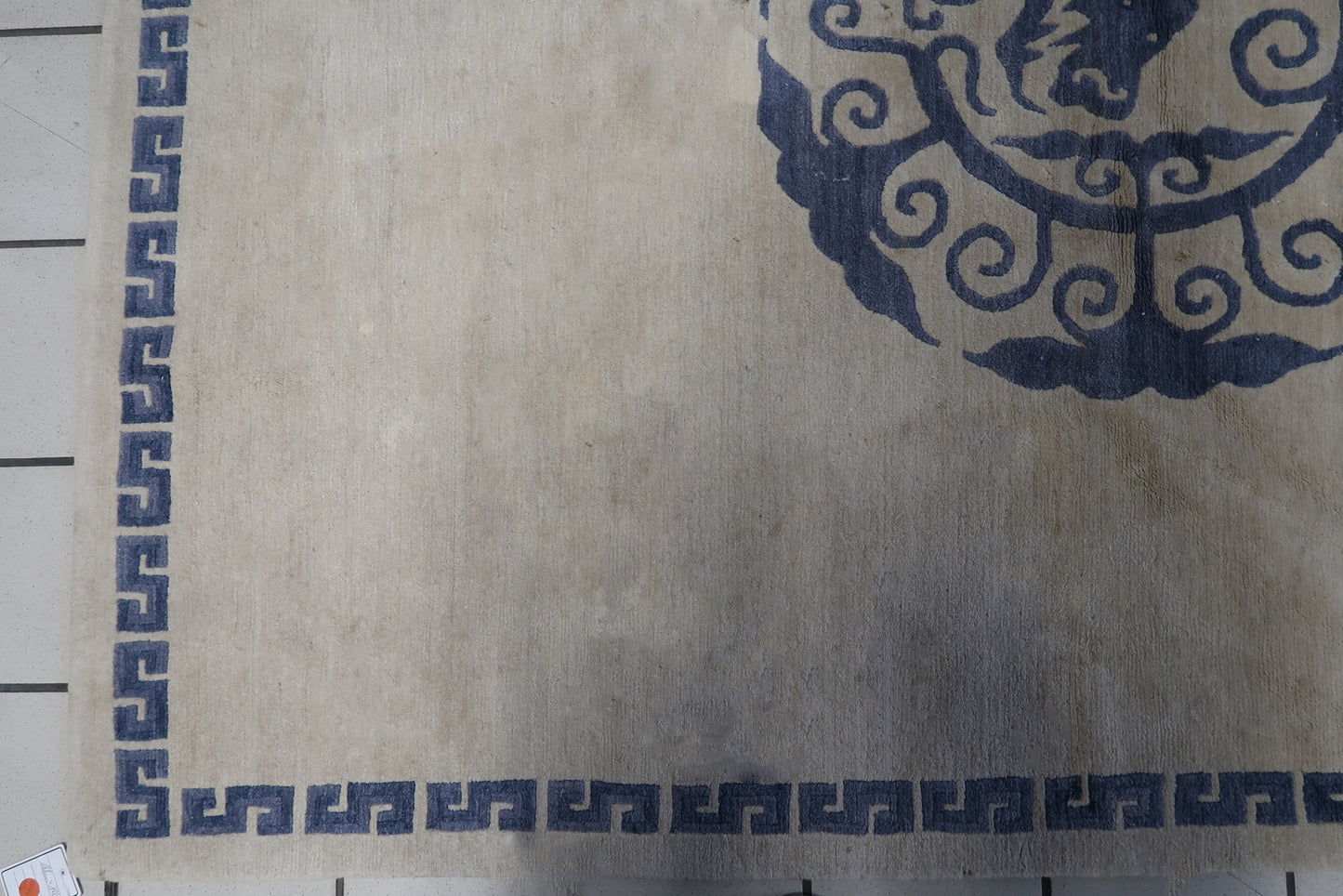 Detailed shot showcasing the wool material of the handmade vintage Tibetan Khaden rug