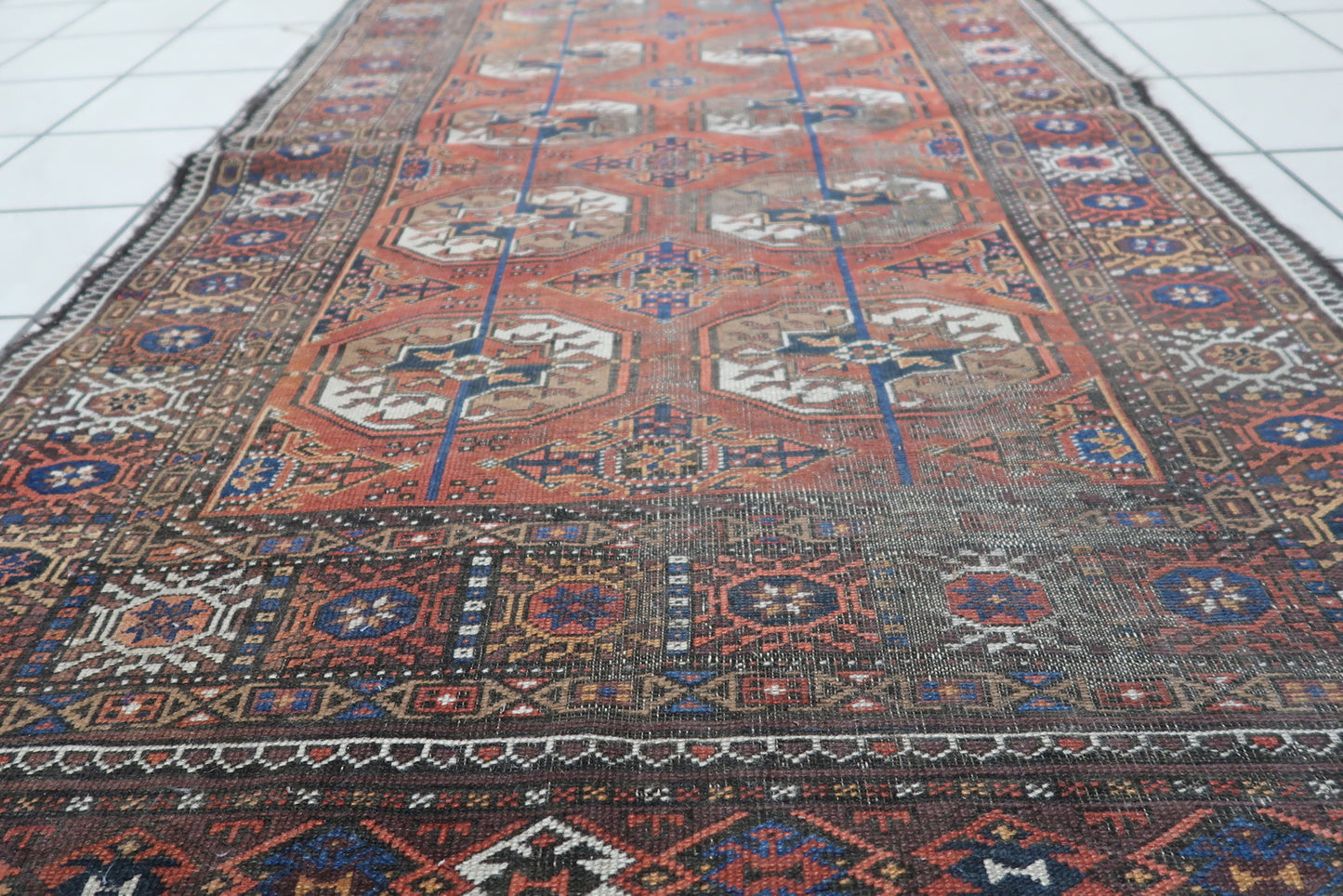 Detailed View of Red and Chocolate Brown Colors on Afghan Baluch Rug