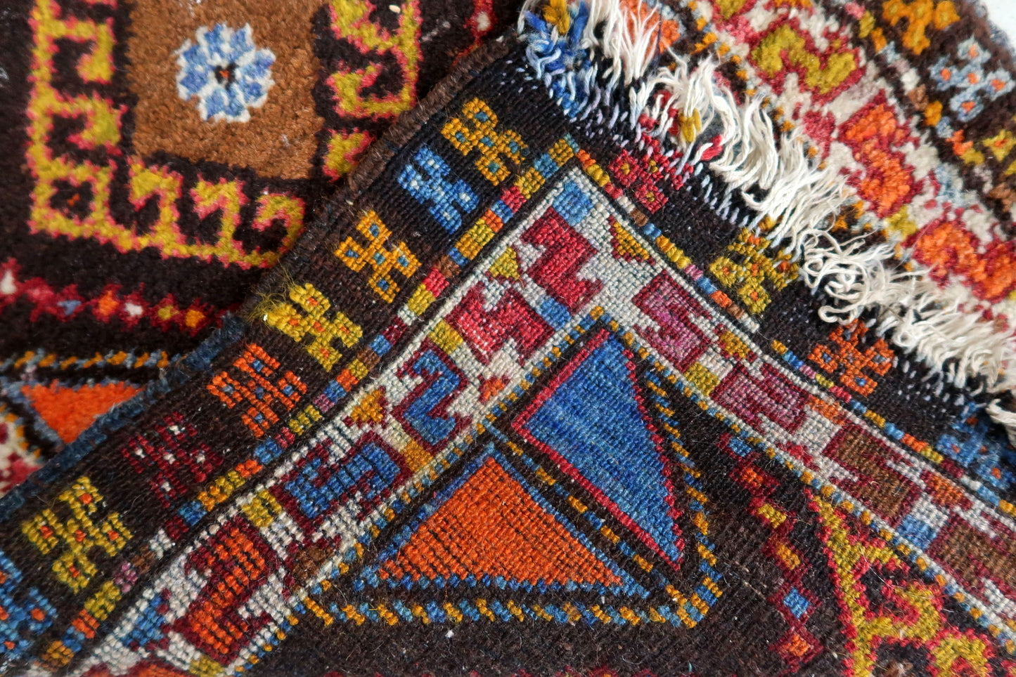 Detailed View of Yastik Rug's Beige and Brown Patterns