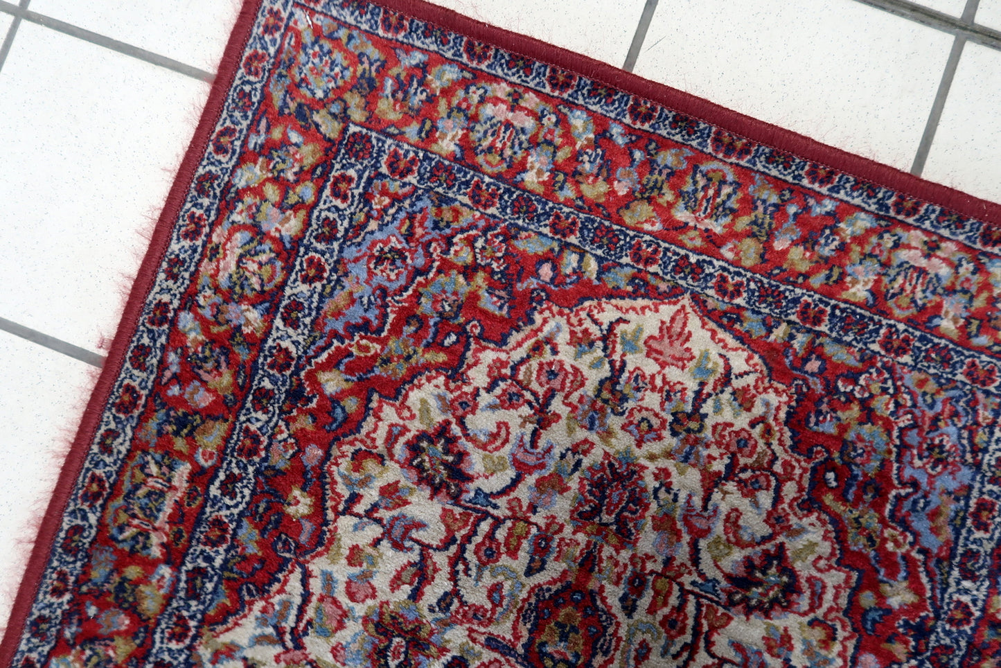 Side view of the small rectangular rug made from high-quality wool fibers
