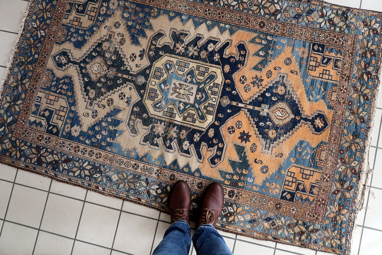 Close-up of elegant study setting with Handmade Antique Caucasian Shirvan Rug - Detailed view showcasing the rug as an elegant addition to a study.