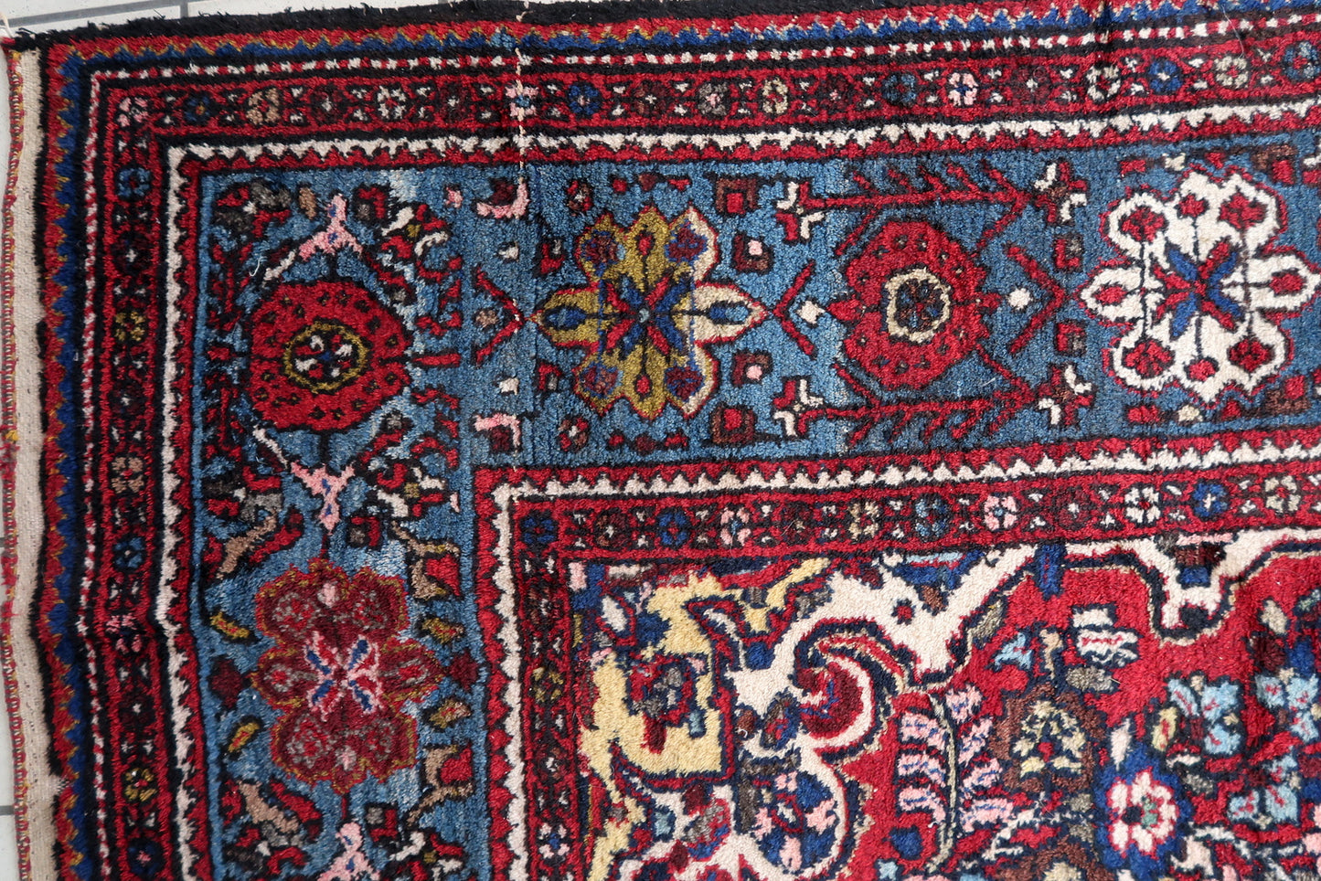 Close-up of green hues on Handmade Vintage Persian Malayer Rug - Detailed view showcasing the rich green tones.