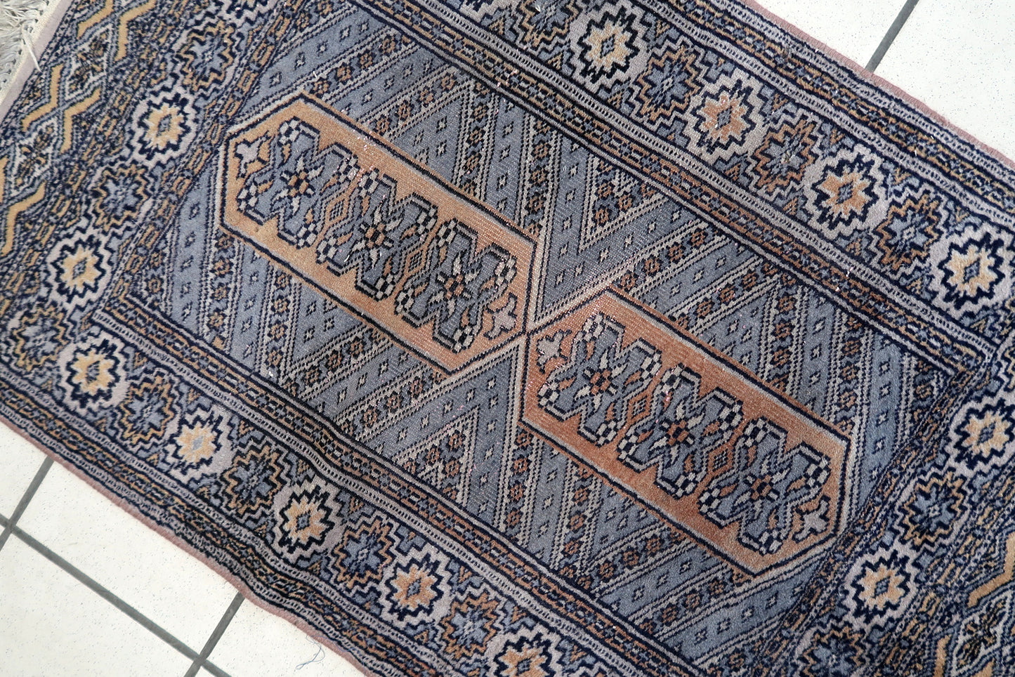 Full view of small rectangular Bukhara rug