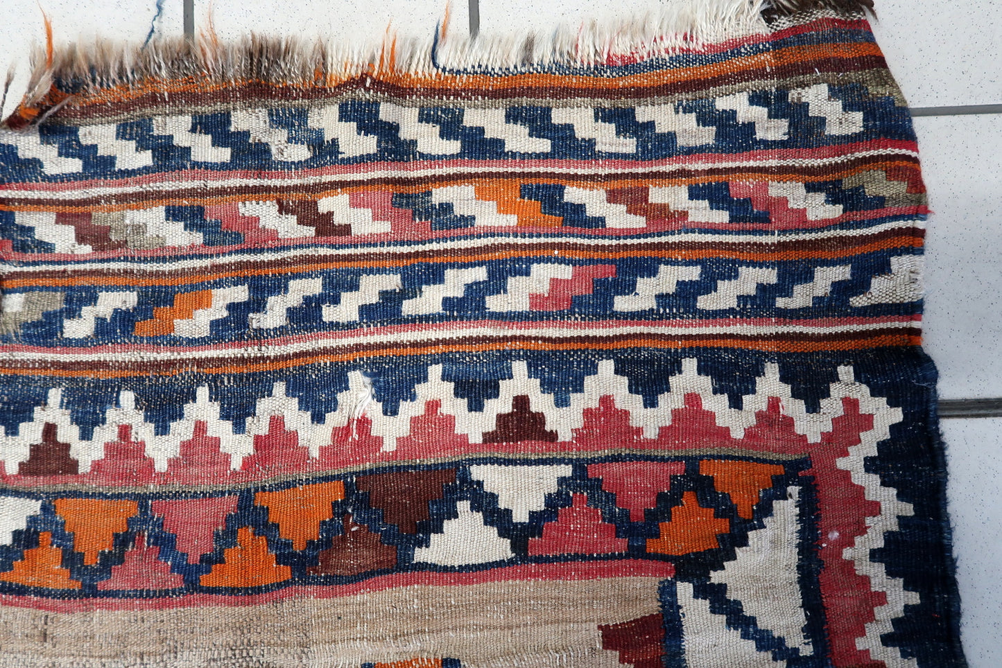 Authentic flatweave texture with bold geometry