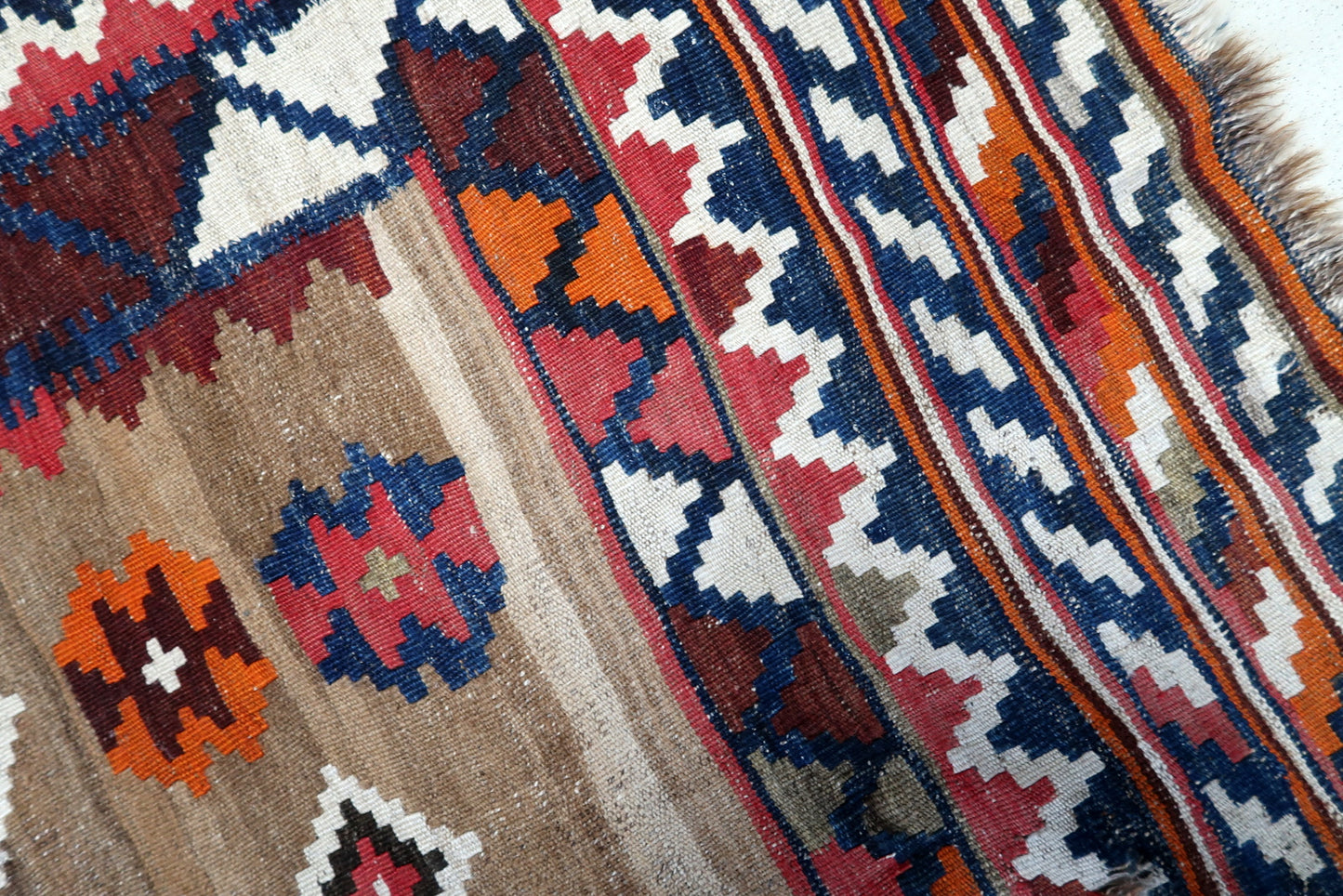 1930s Ardabil rug with rustic orange accents