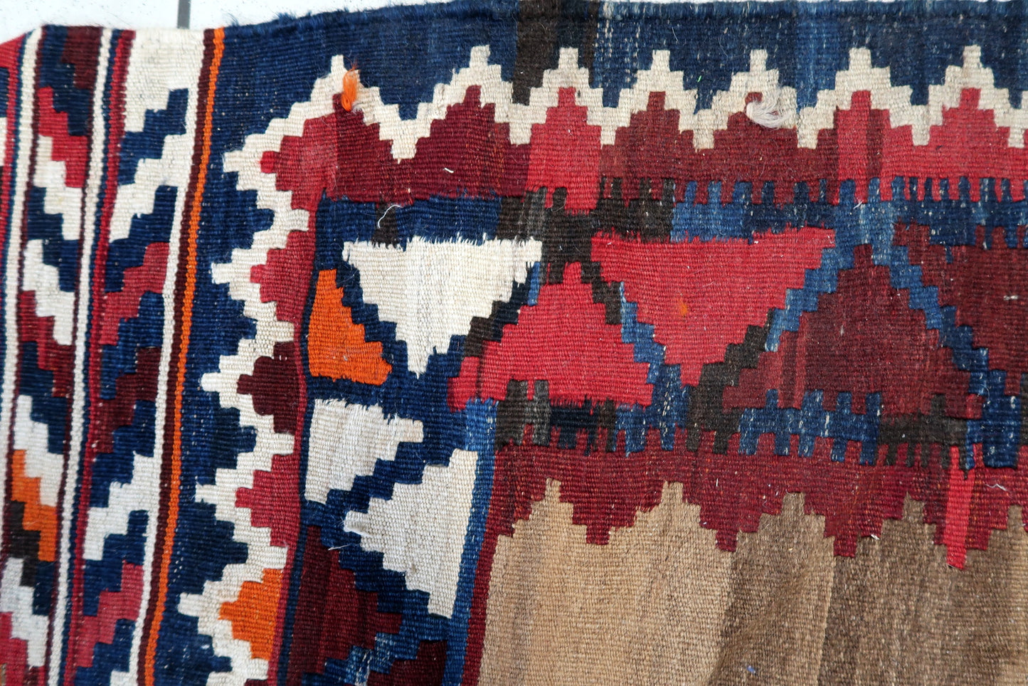 Close-up of tribal motifs and abrash details