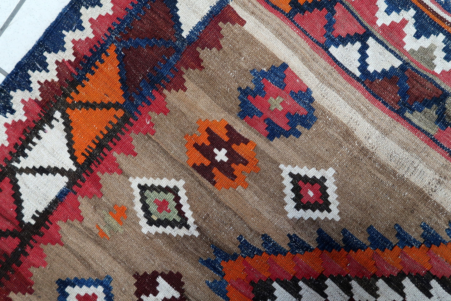 Persian kilim rug with red and indigo design