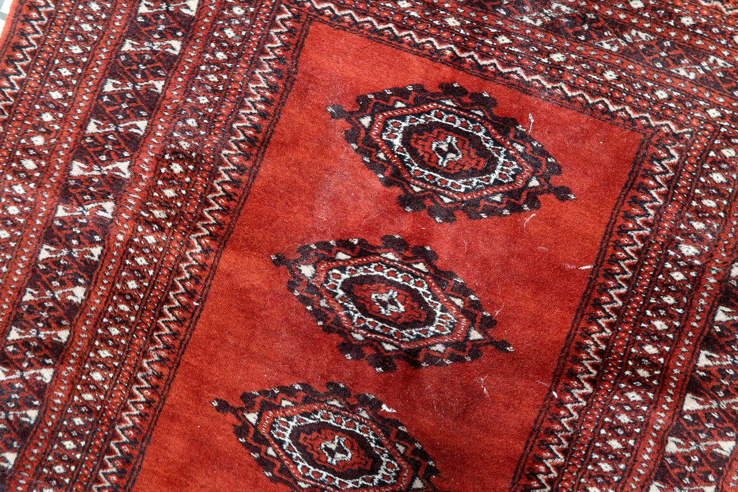 Close-up of wool pile and tribal pattern