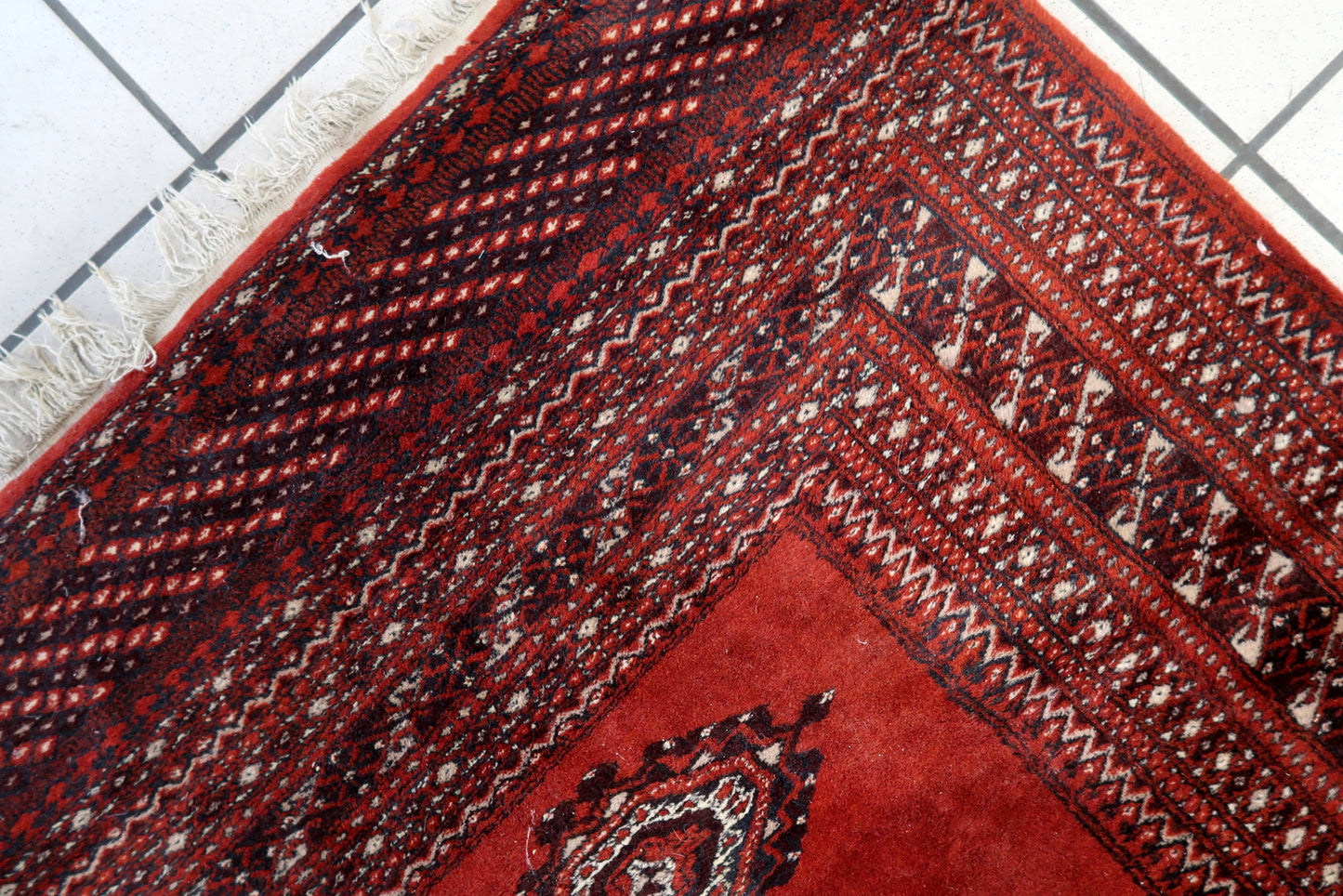 Hand-knotted vintage rug with symmetrical layout