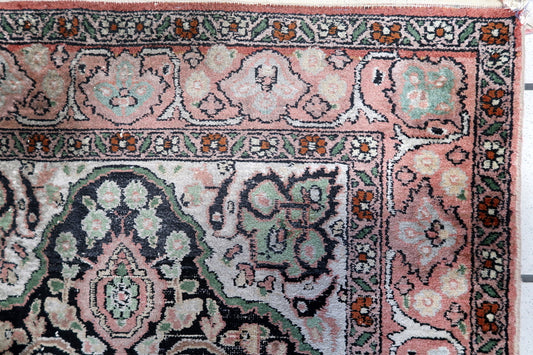 Close-up of the hand-knotted silk texture on this 1950s Persian rug
