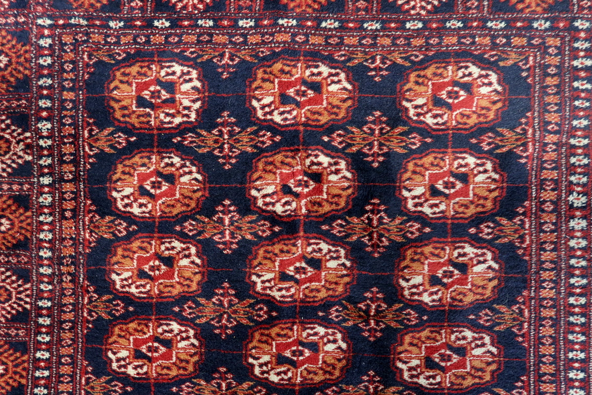 A close-up of the octagonal medallions, highlighting Bukhara craftsmanship