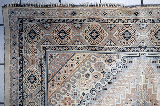 Close-up of the diamond medallion patterns on the textile