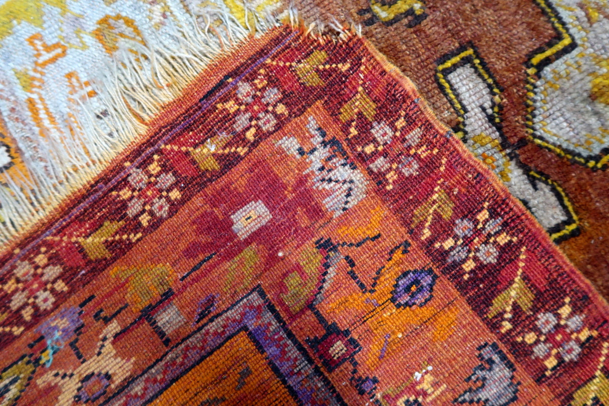 Handwoven texture of the rug showing traditional tribal craftsmanship