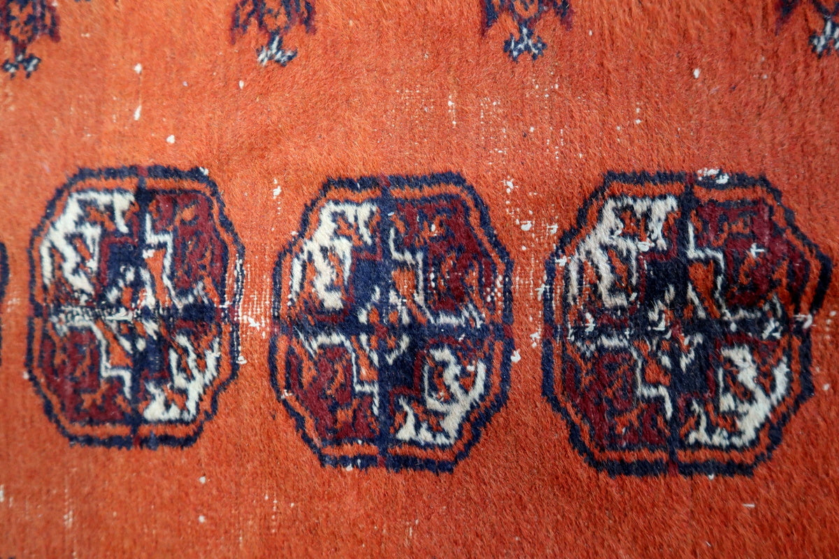 Close-up of the detailed weaving techniques used in the traditional Bukhara runner