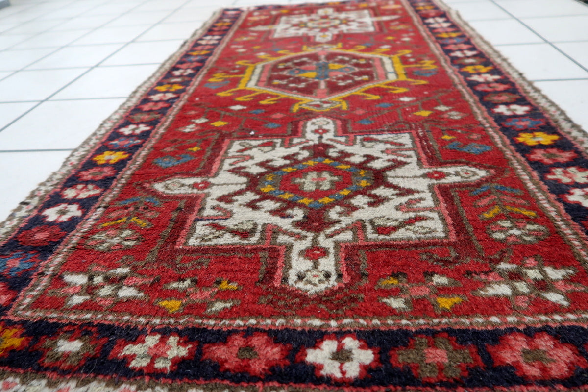 Image of the rug's tag or backing, highlighting its handwoven craftsmanship.