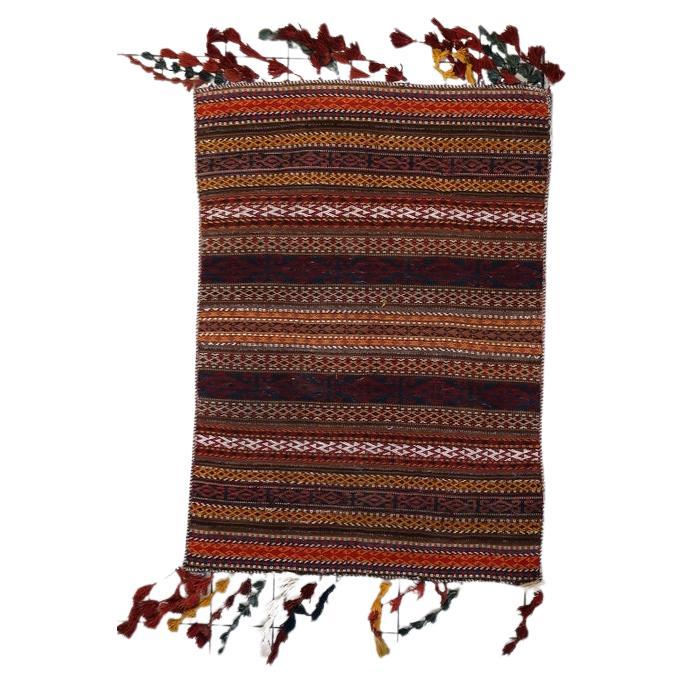 Handmade antique Moroccan Berber Kilim rug with geometric Amazigh motifs and vibrant colors