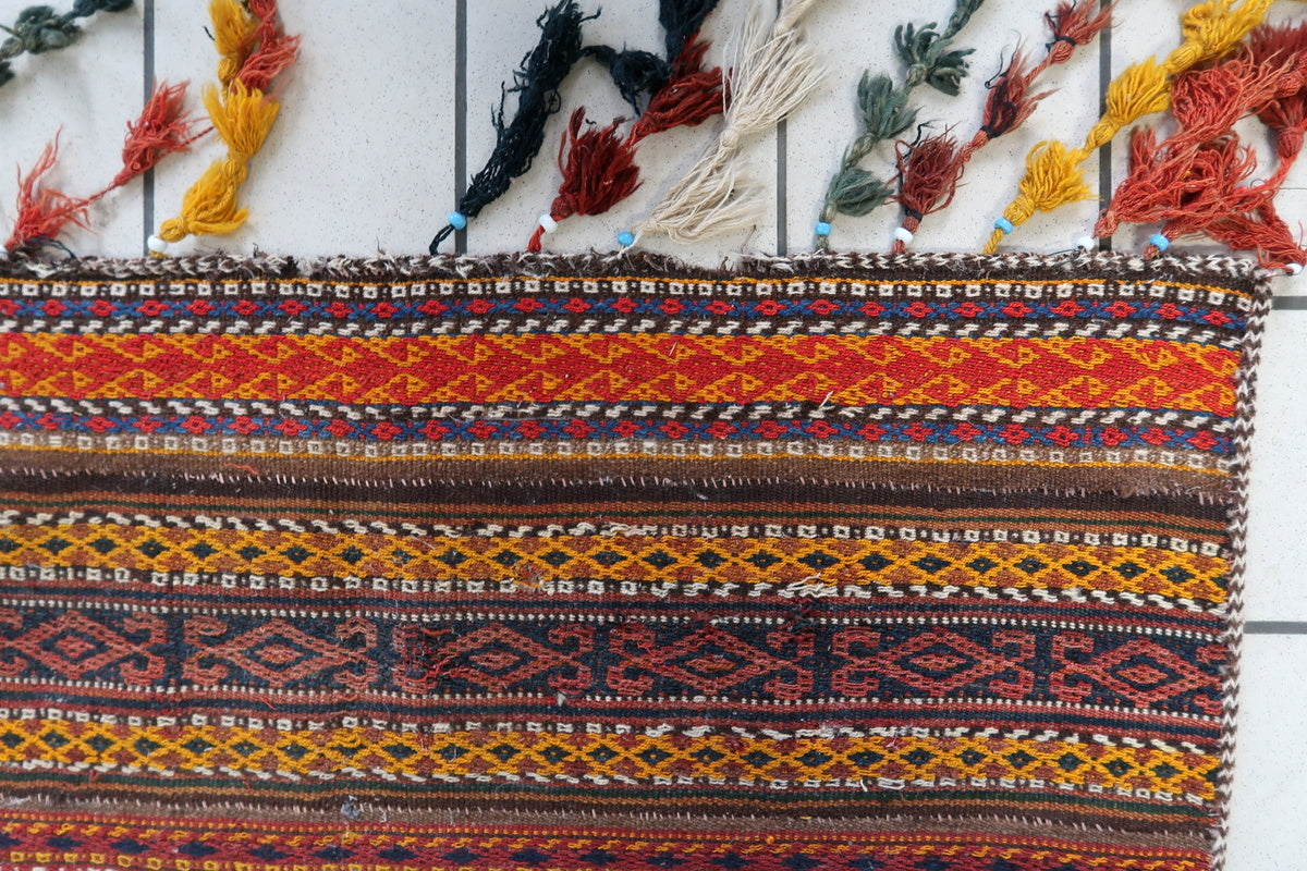 Vintage Moroccan tribal rug with diamond motifs and warm earthy tones