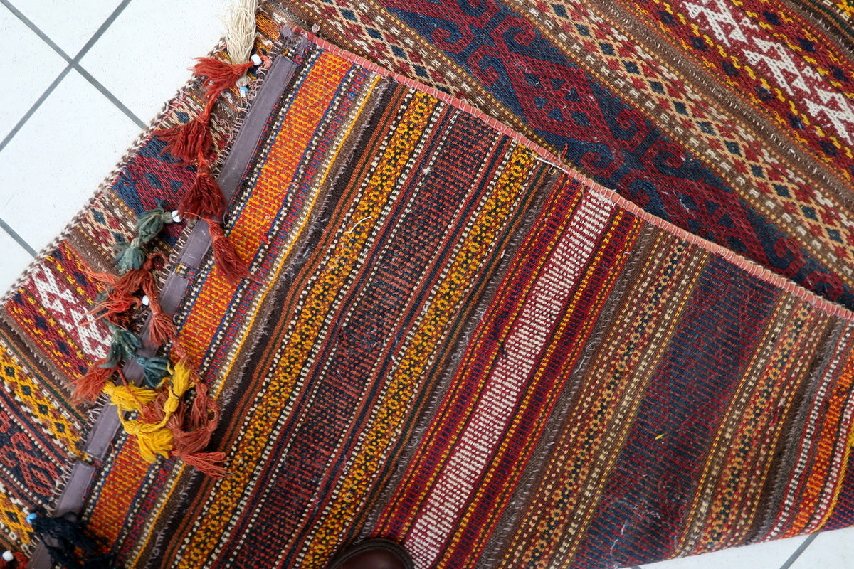 Traditional North African wool rug featuring Berber artistry and textile heritage