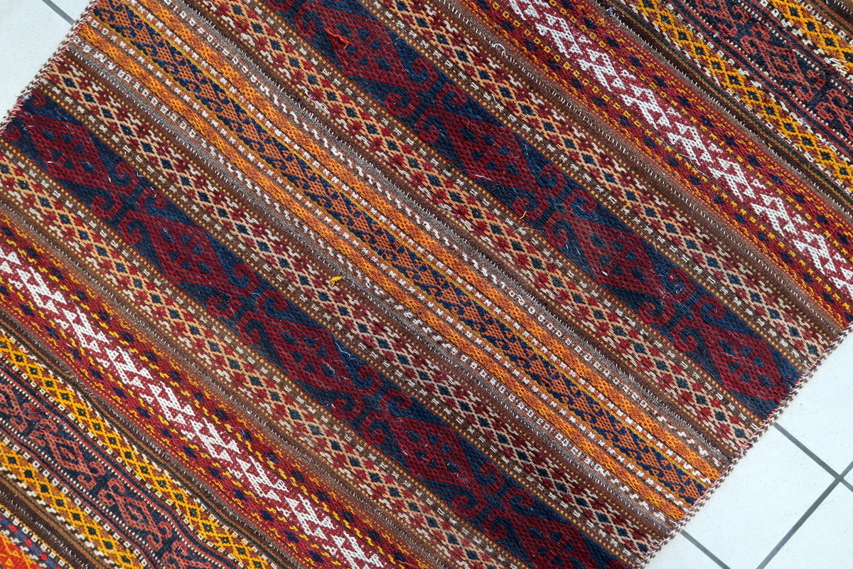 Detailed view of the vintage Berber rug’s handwoven wool texture and natural dyes