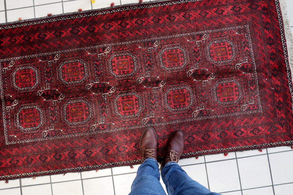 Artistic shot highlighting the depth of color and texture in the rug’s design