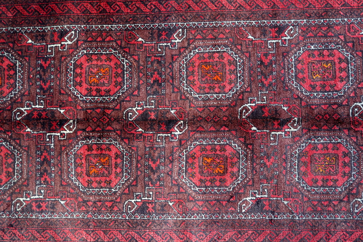 Photo of the rug in a traditional living room setup