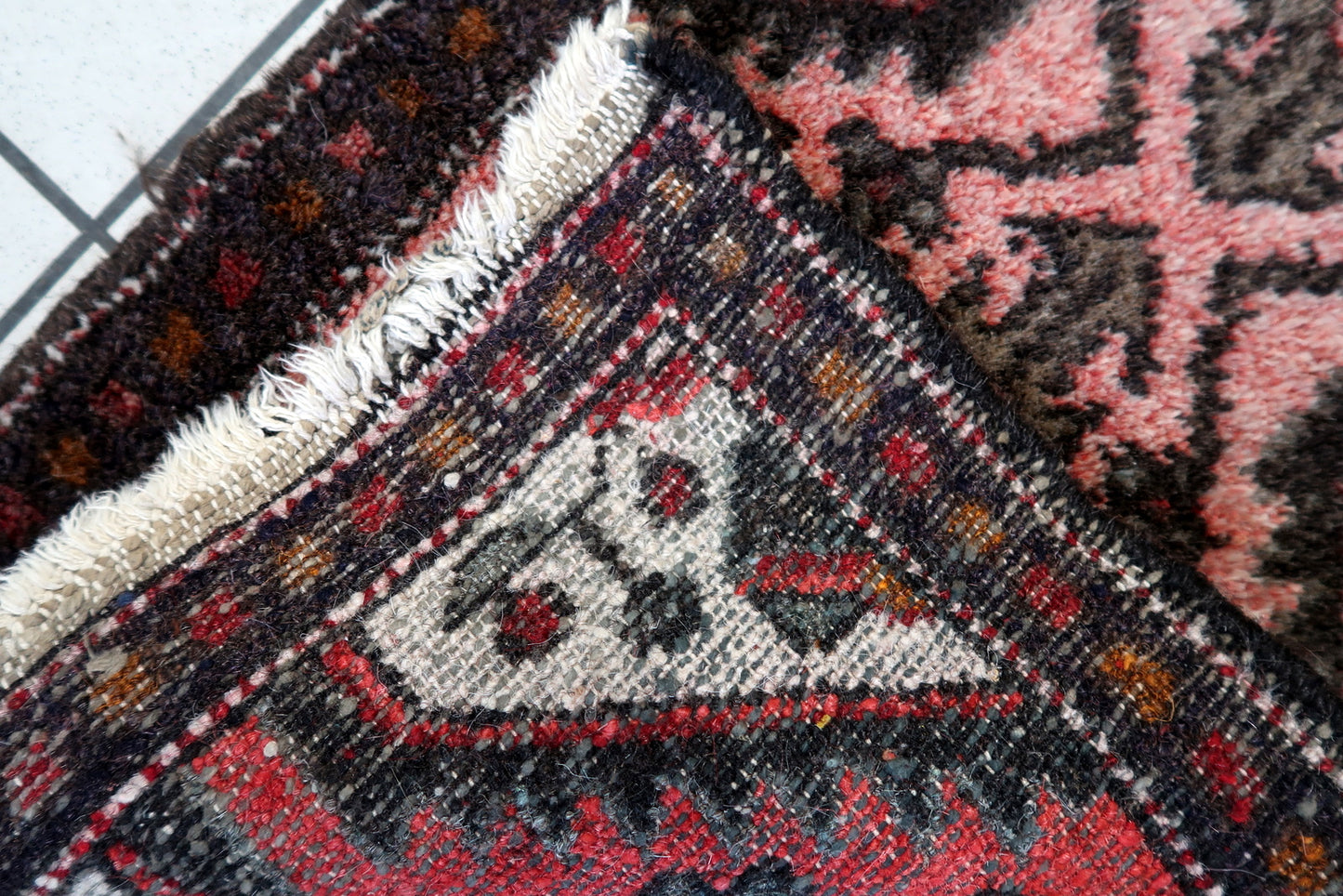 Soft wool pile on a 1960s handmade Uzbek runner rug