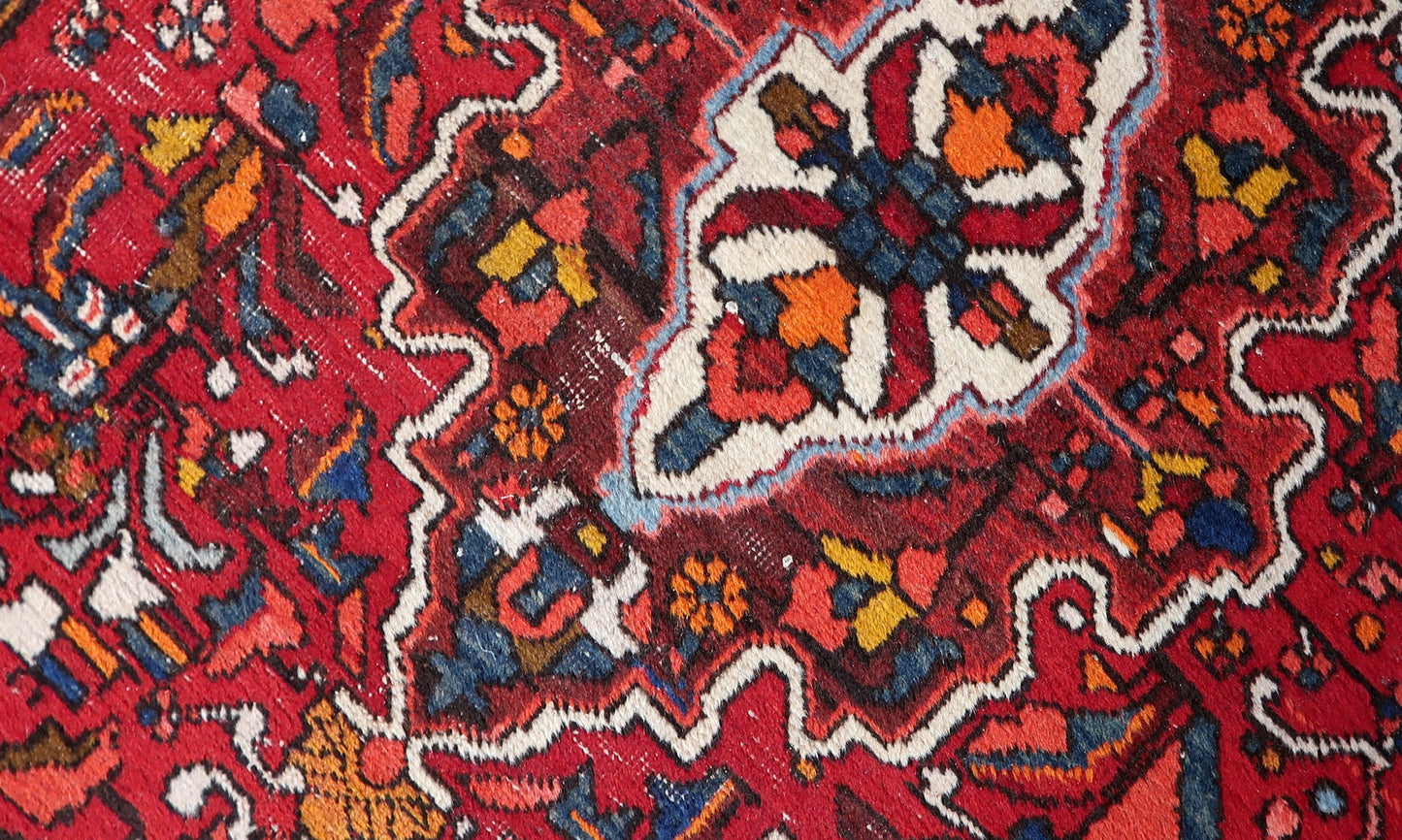 Antique Persian Karajeh rug with symmetrical multi-layered border design