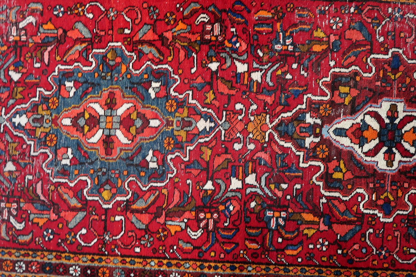 Textured low-pile wool surface of a 1920s handmade Persian runner