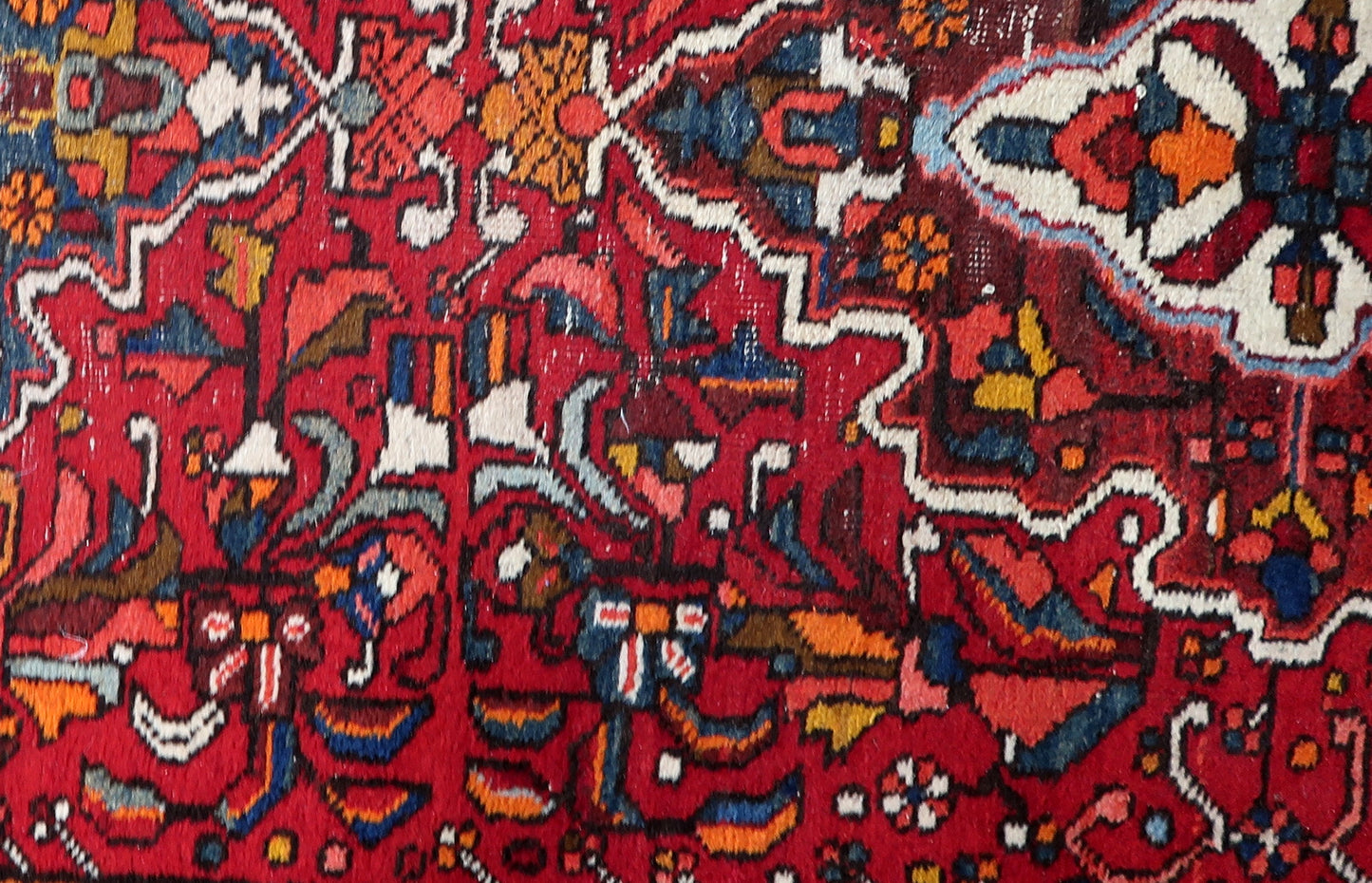 Fringe details on a 100-year-old Persian Karajeh carpet