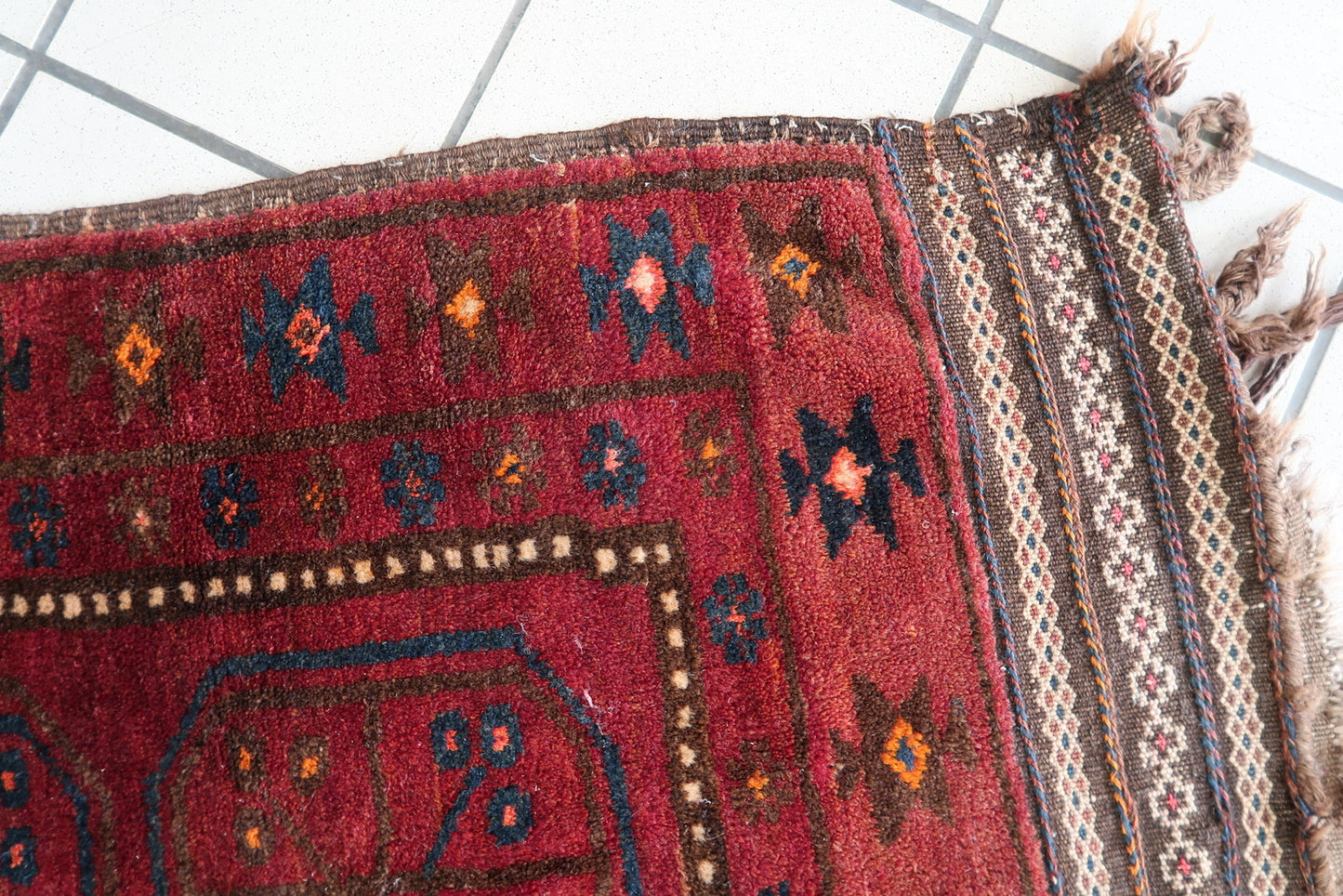 Compact, handmade Afghan wool rug ideal for small spaces