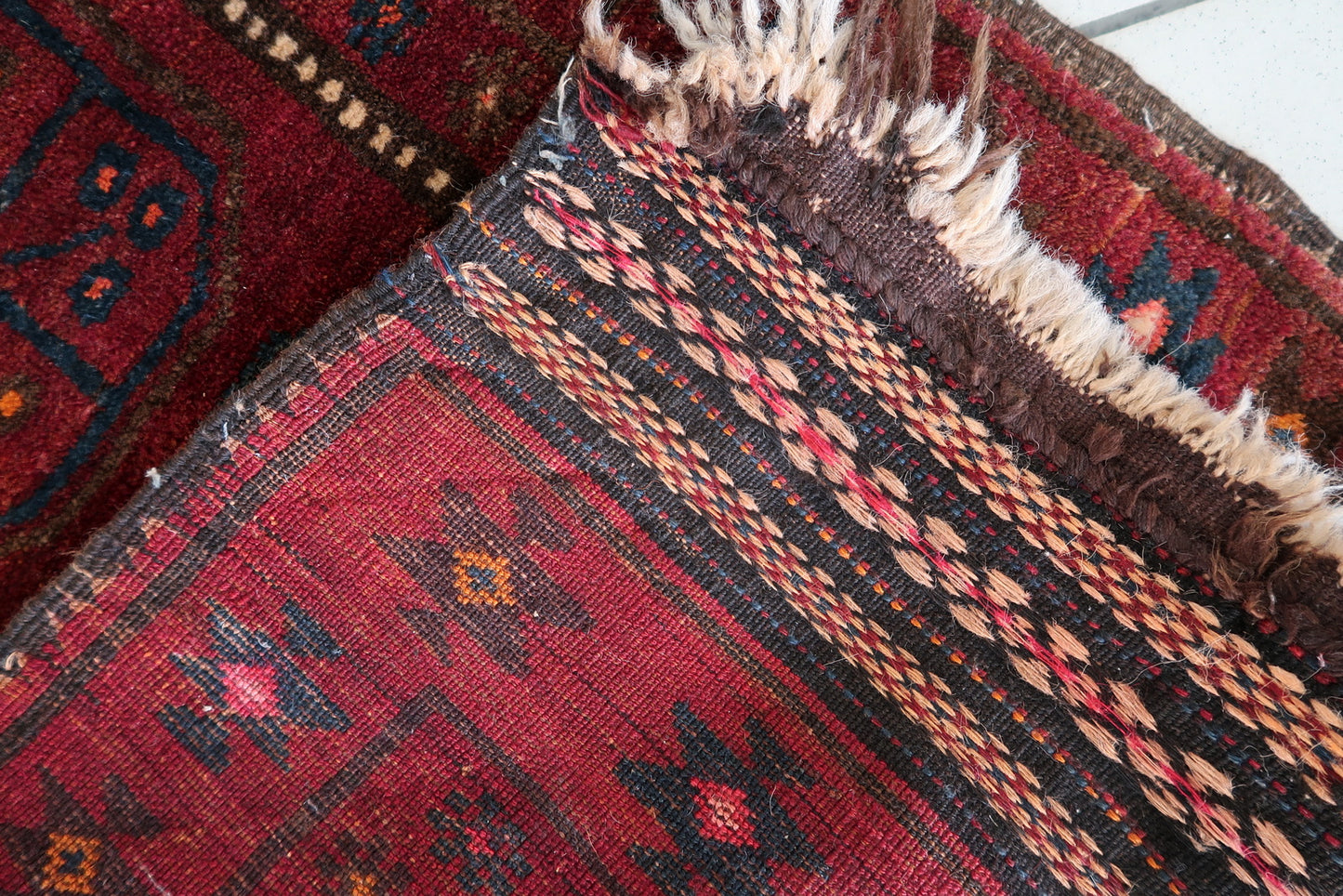 Traditional 1950s Afghan rug, perfect for collectors and designers