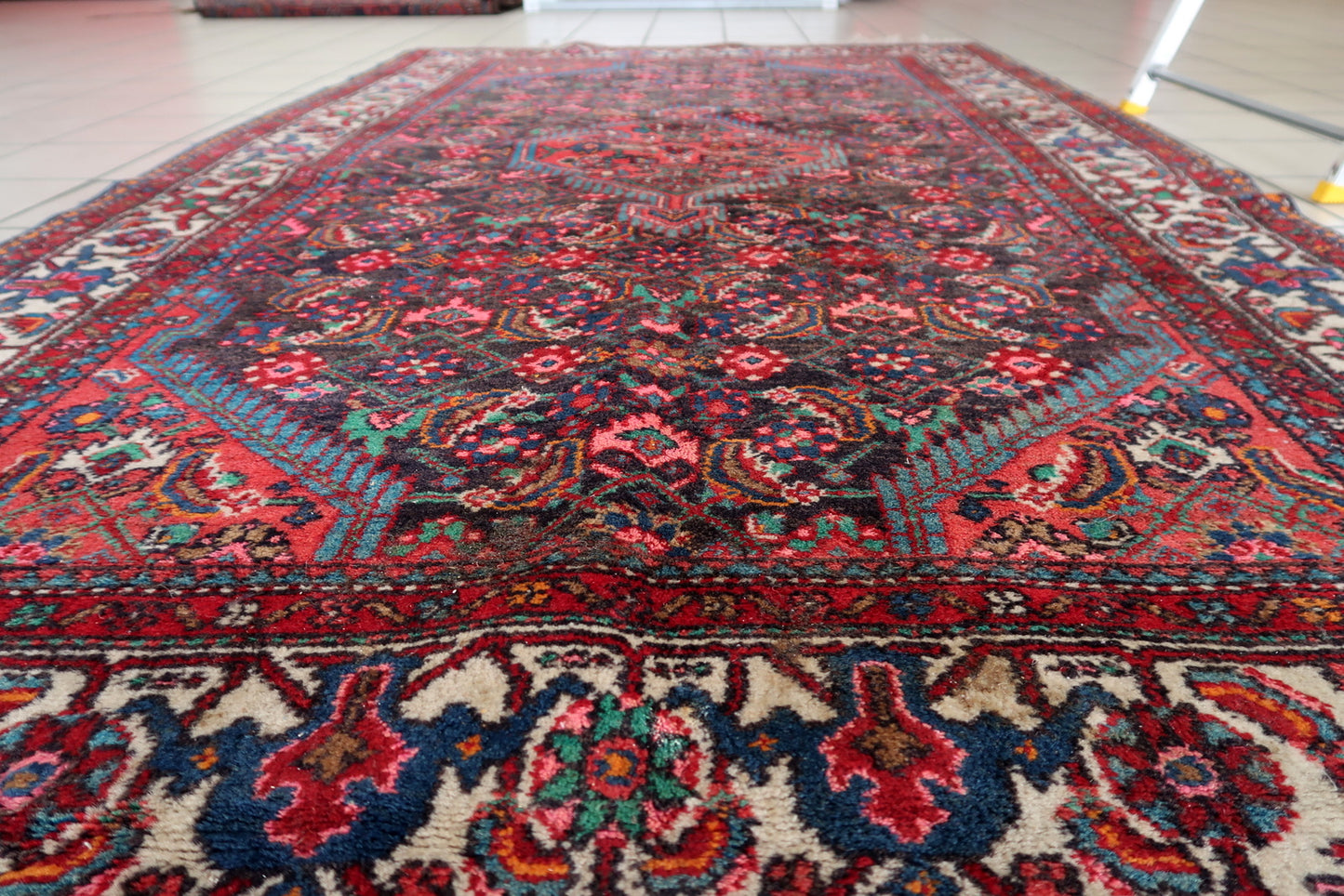 Collectible handmade Persian rug with medallion and floral motifs