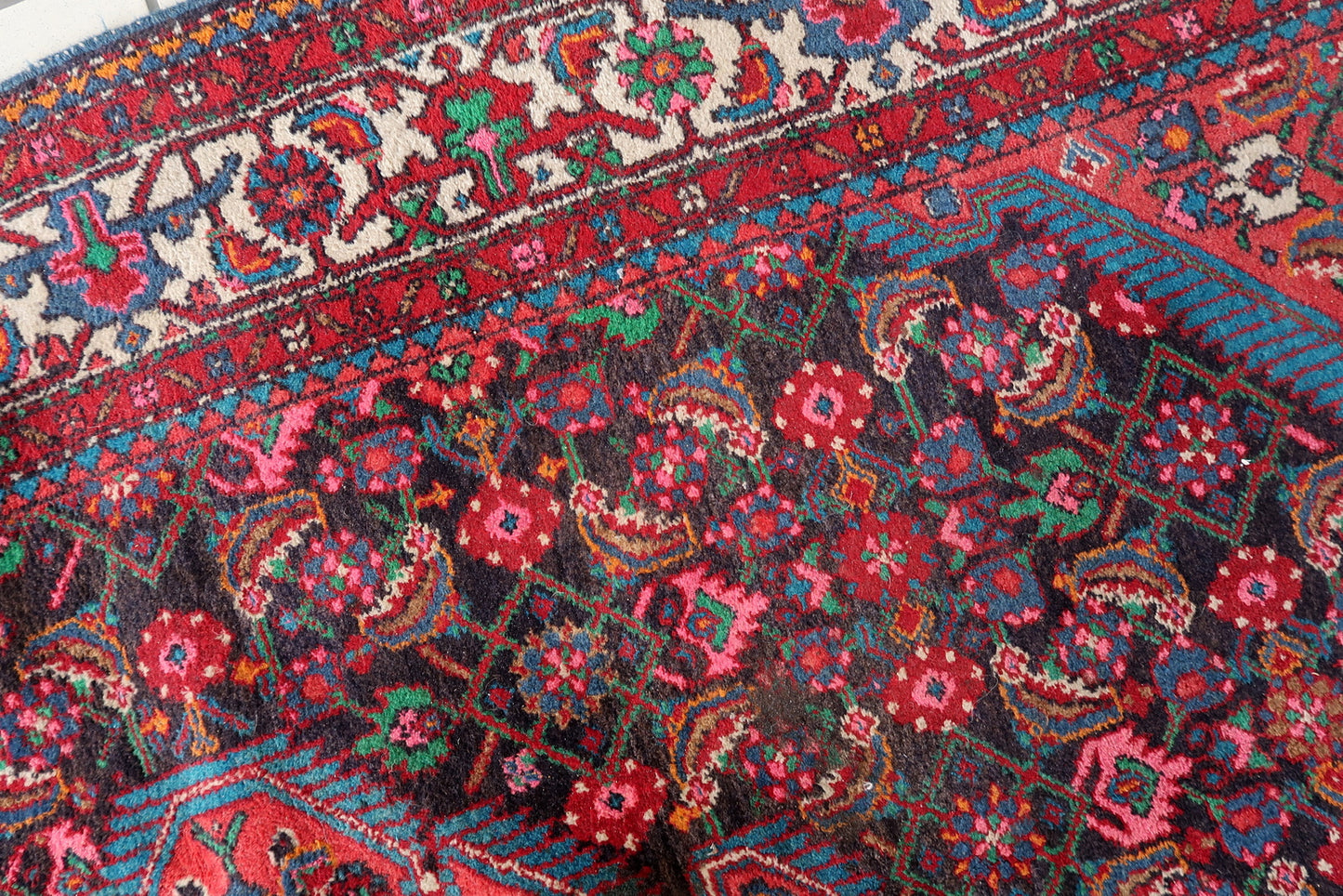 Authentic handmade Persian rug with central medallion design