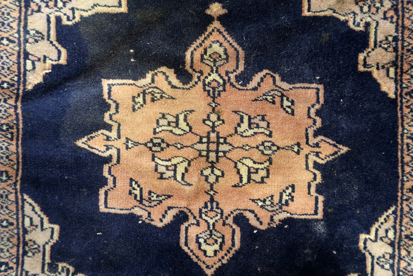 Vintage Bukhara rug with geometric patterns