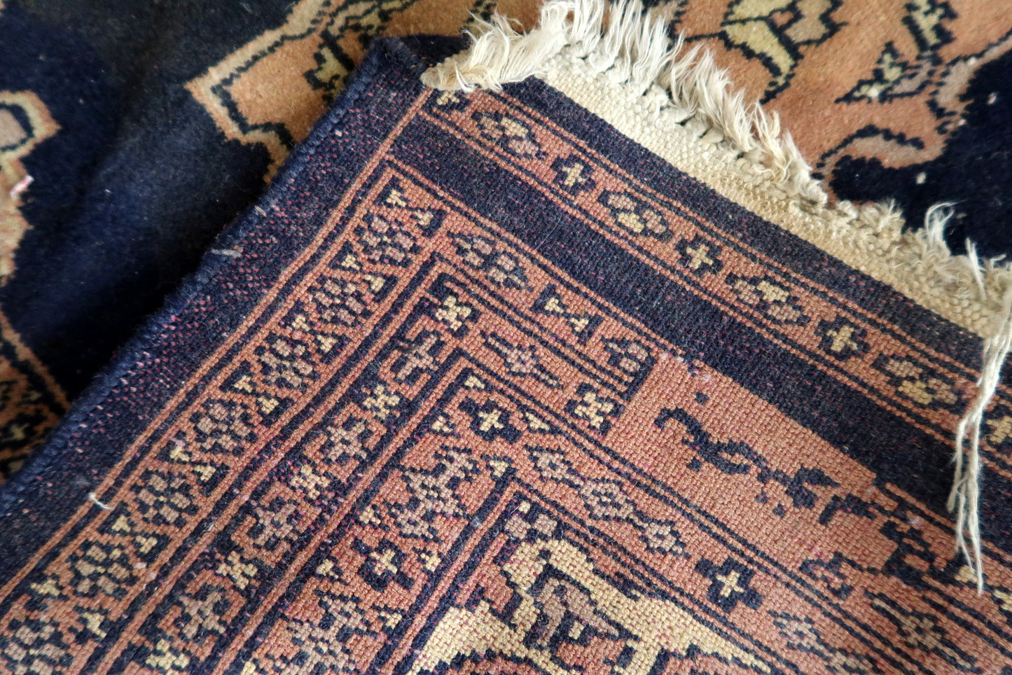 Handmade Bukhara area rug β traditional design