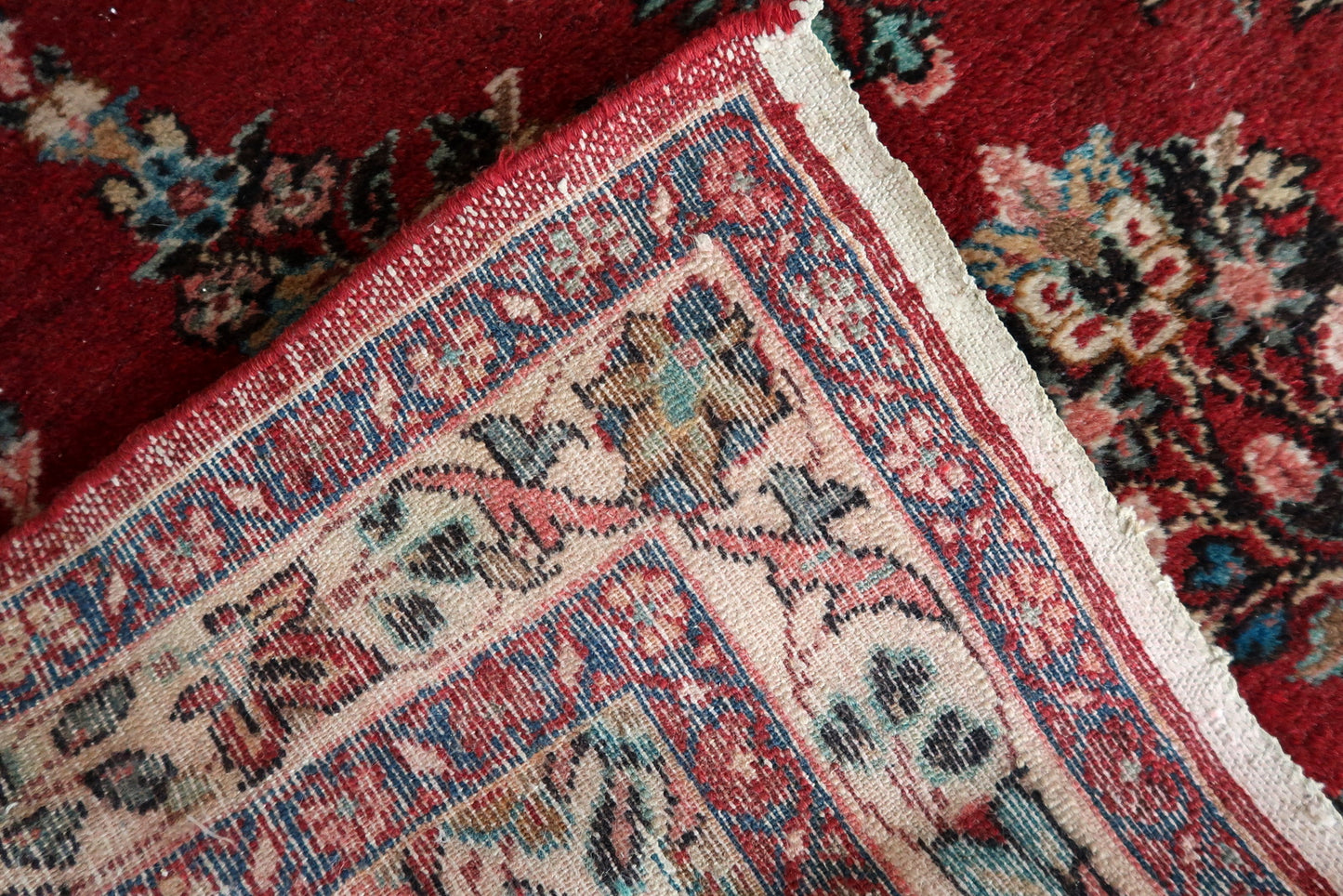 Rectangular Persian wool rug with rich design