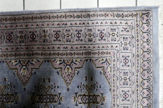 Bukhara carpet Central Asian geometric borders tribal motifs