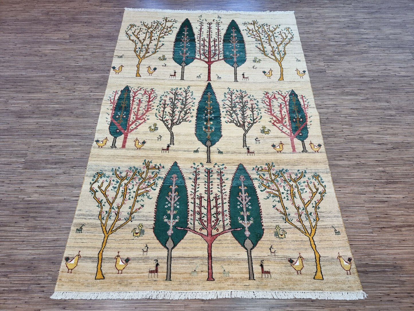 Symmetrical tree and bird patterns on the Handmade Persian Gabbeh Rug