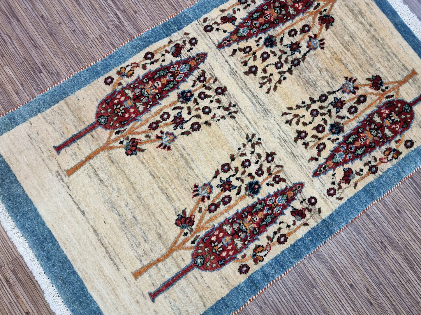 Full-length view of beige 4' x 2.4' Persian wool carpet