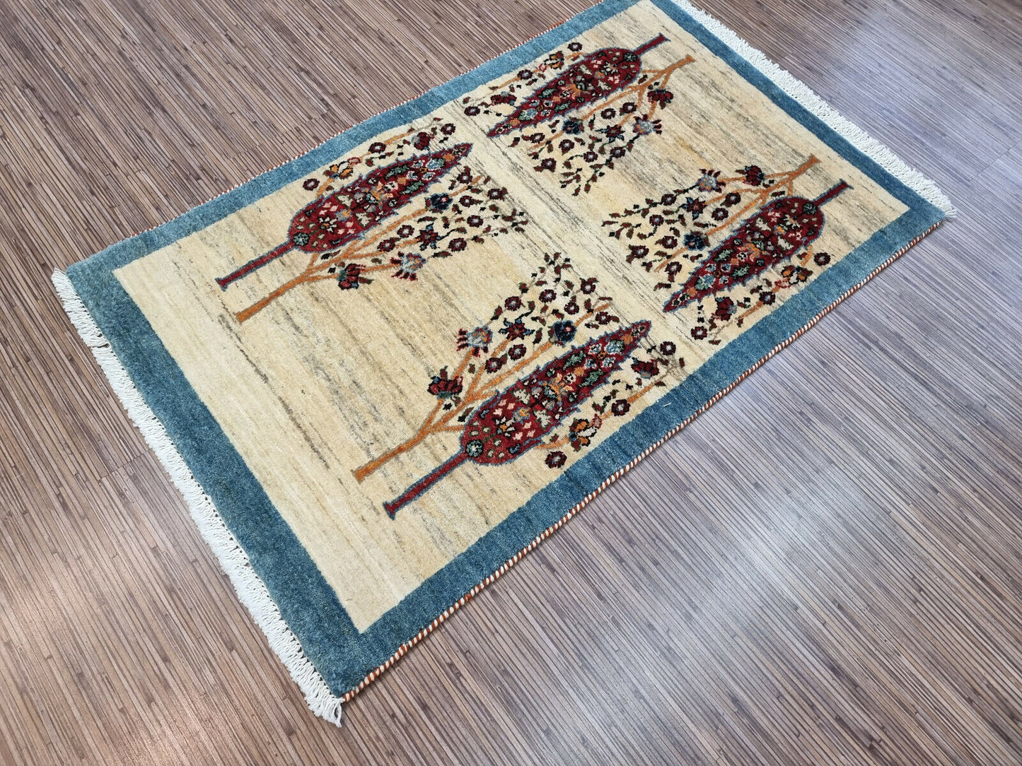 Room setting showing Gabbeh rug in a cozy living room space