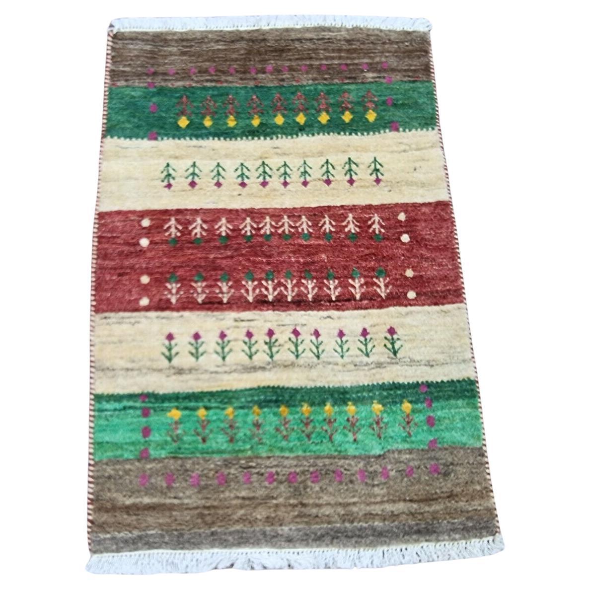 Full view of vintage Persian Gabbeh rug, 87x57 cm / 2.85x1.87 ft