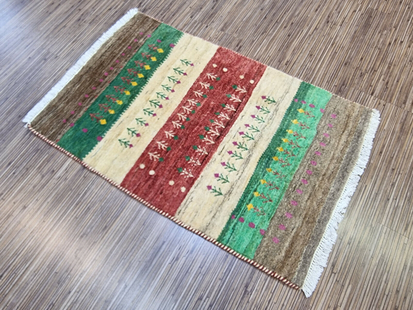 Tree motif design on Persian Gabbeh rug (close-up view)