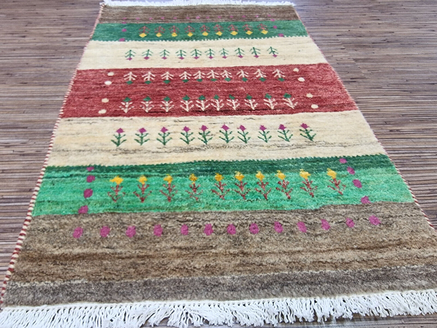 Persian Gabbeh rug placed in a living room setting