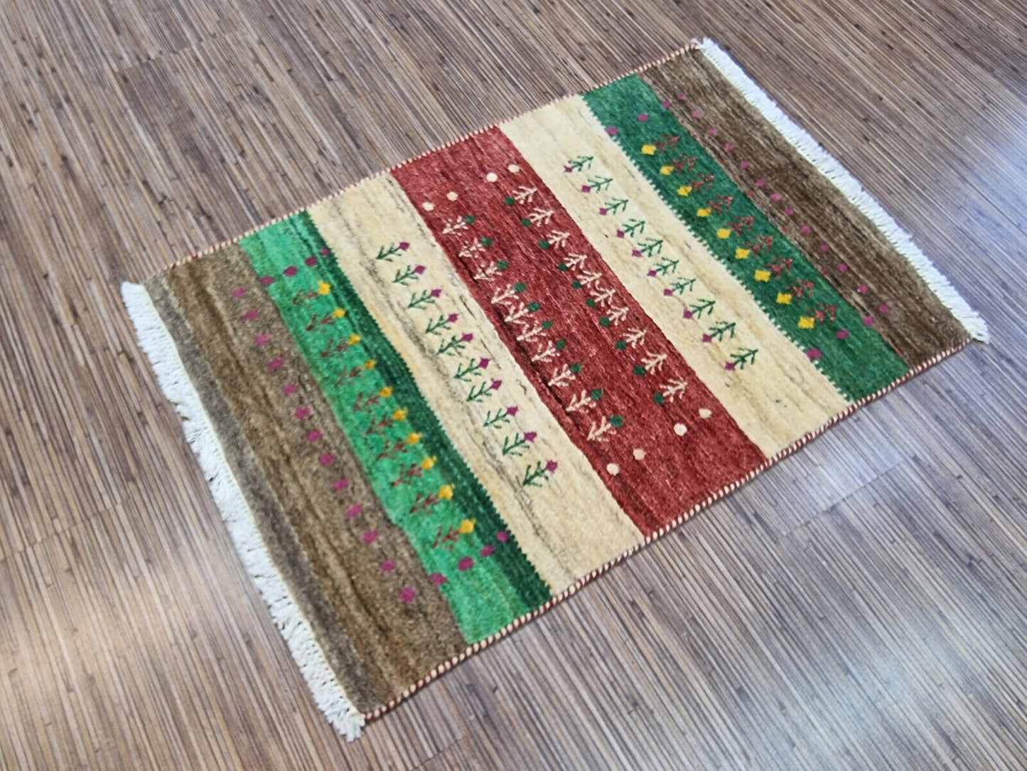 Backside of Persian Gabbeh rug showing cotton foundation