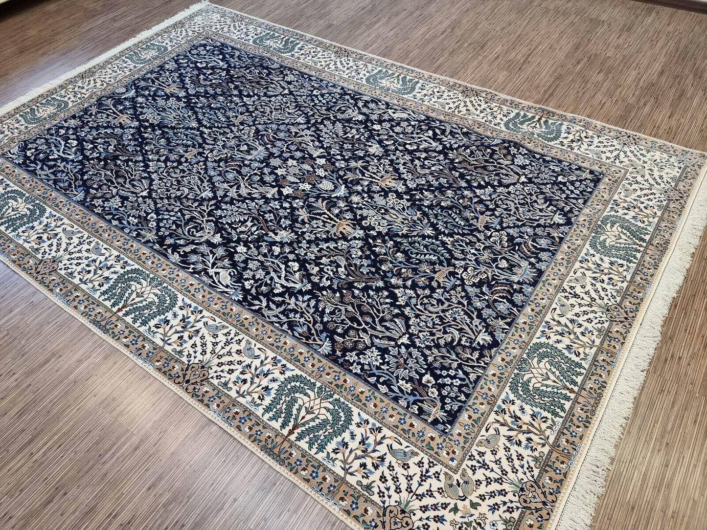 Navy blue Persian rug with cream border